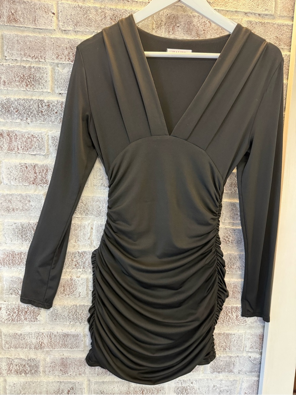 Sleek Black Ruched V-Neck Mini Dress